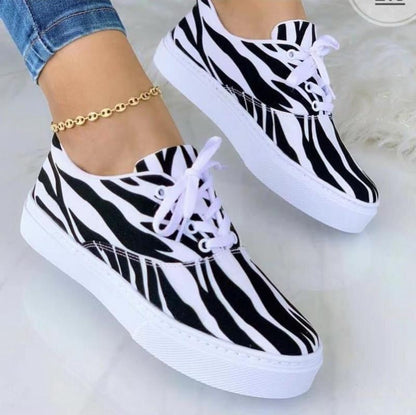 Fashion graffiti women sneakers by Coffee Jasper featuring colorful artistic design on stylish footwear.