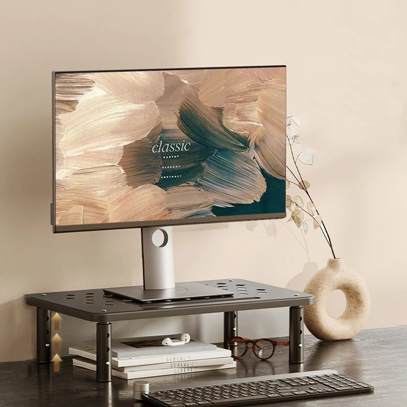 Adjustable telescopic computer desk monitor holder with elevated support for ergonomic PC setup and improved workspace organization.