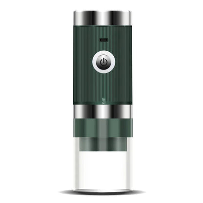 Maroon Asteria portable electric coffee grinder with USB charging, compact kitchen device, showing stainless steel grinding chamber.