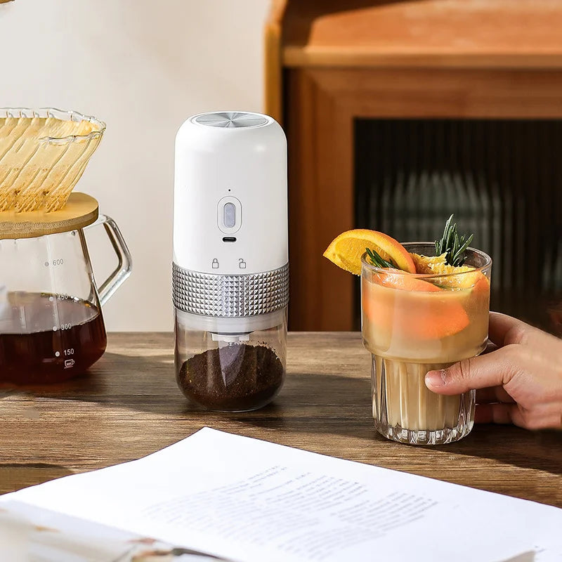 Maroon Asteria electric USB wireless coffee grinder with ceramic blades for professional kitchen use, compact and modern design