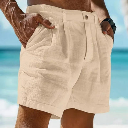 Raspberry Eurybia linen-cotton beach shorts with a relaxed fit, featuring a drawstring waistband and tropical print for summer holidays.