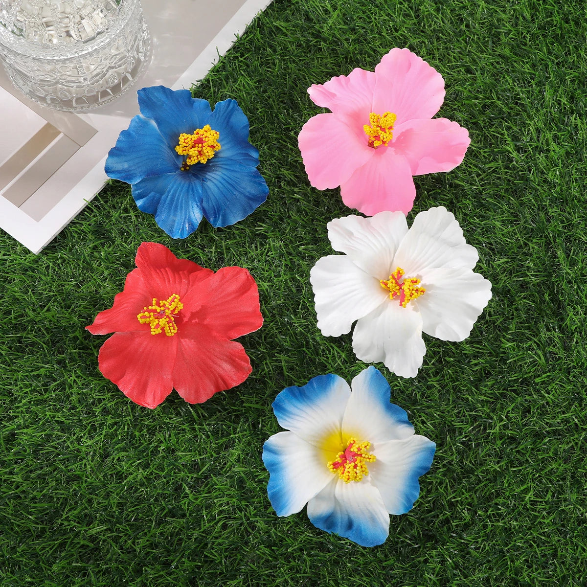 Raspberry Eurybia Away Hawaiian Flower Hair Clip featuring colorful tropical flower design for hair accessories.