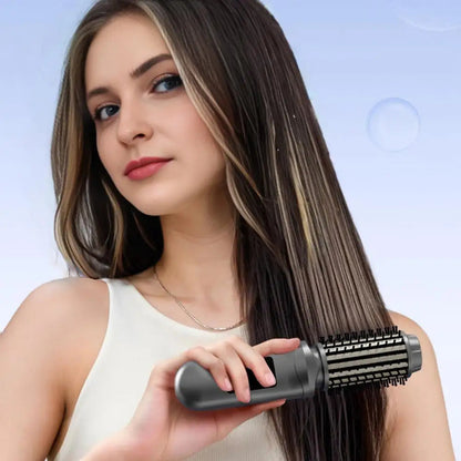 Maroon Asteria cordless USB rechargeable hair curling iron brush with round heated design for easy travel hair styling.