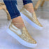 Red Iphigenia crystal flat moccasins for women, gold, black, and rose gold loafers with shiny embellishments and comfortable slip-on design.