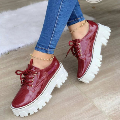 Black, red, and pink thick heel flat platform Oxford shoes for women by Coffee Jasper, featuring a stylish sneaker-inspired design.