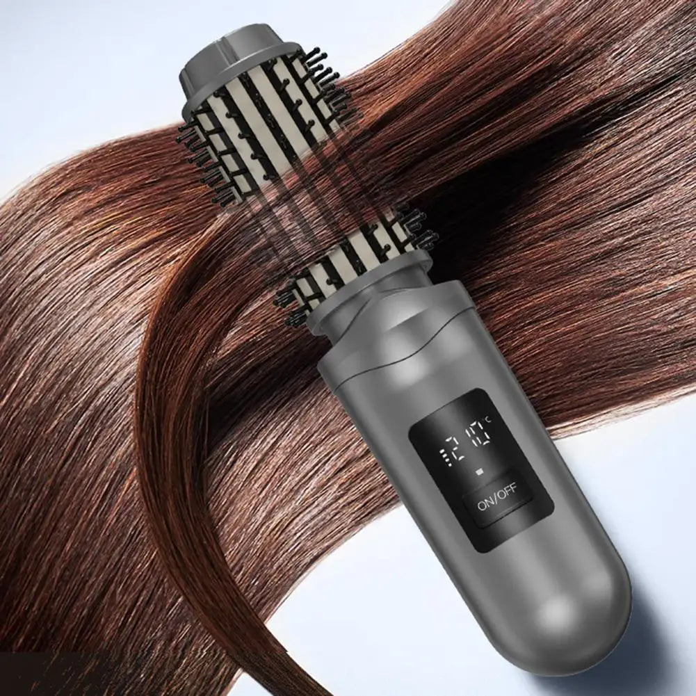 Maroon Asteria cordless USB rechargeable travel curling iron brush with heated round barrel for hair styling.
