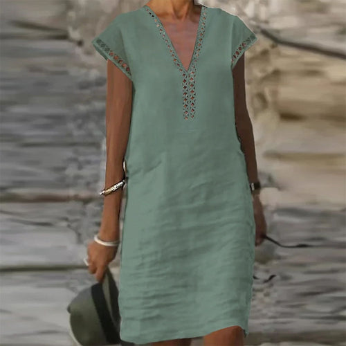 Elegant cotton linen dress by Yellow Eleusis featuring flowing fabric and stylish design, perfect for casual or semi-formal wear.