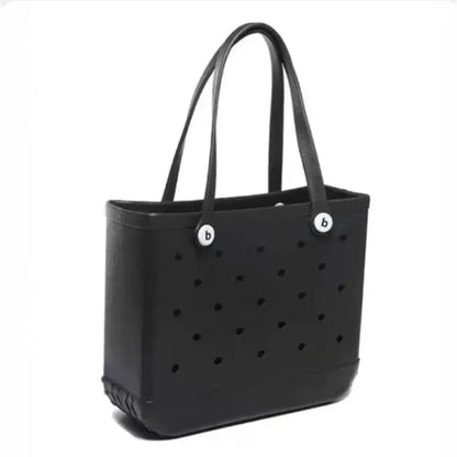 Bright pink EVA rubber waterproof beach tote bag by Raspberry Eurybia, featuring a spacious design for beach essentials.