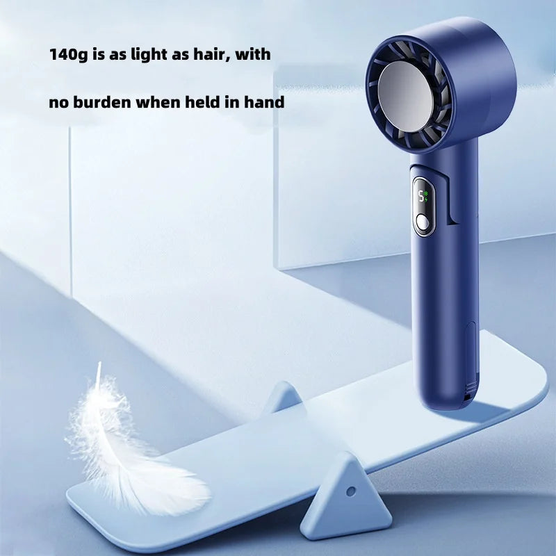 Portable refrigeration handheld fan with built-in power bank, shown with Maroon Asteria bag or wallet, compact and convenient design.