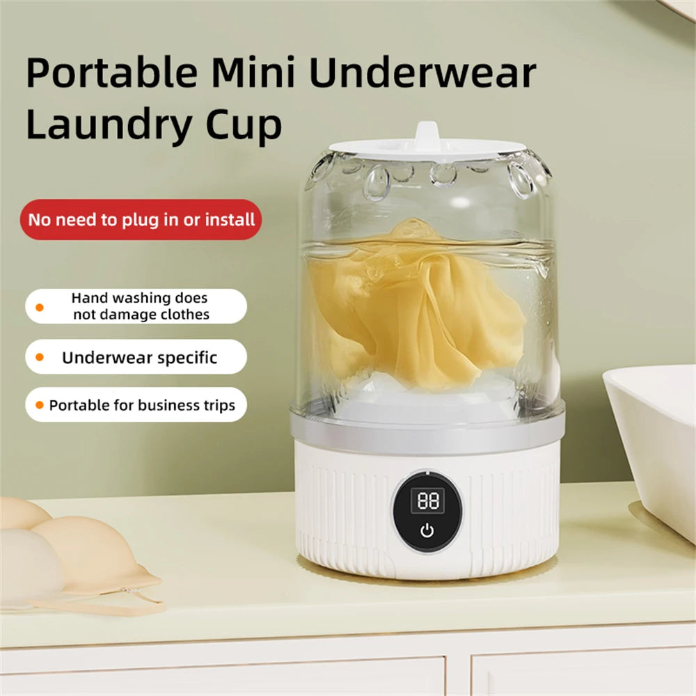 Portable Maroon Asteria mini washing machine for underwear and socks, compact home improvement appliance with charging feature.