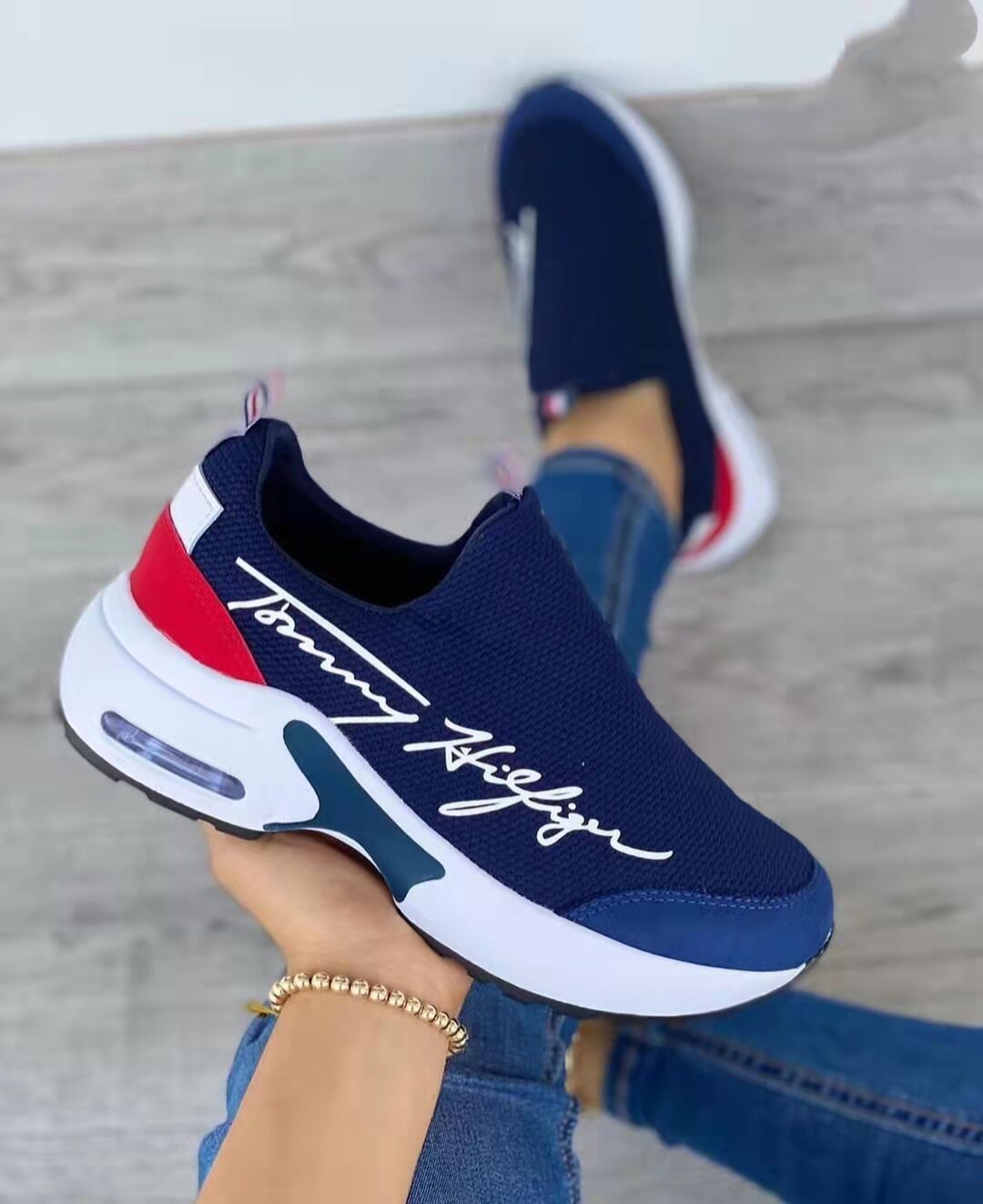 Casual breathable wedge sneakers for women by Silver Juneberry, featuring a flat sole and stylish design for comfortable walking.