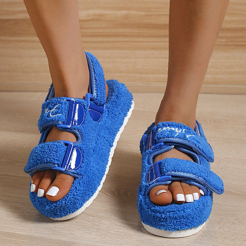 Silver Juneberry summer women’s flat sandals with platform design, featuring stylish open-toe and ankle strap details.