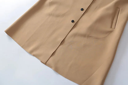 Yellow Angel light luxury windbreaker with simple French fashion style, mid-length autumn tech accessory in soft, stylish fabric.