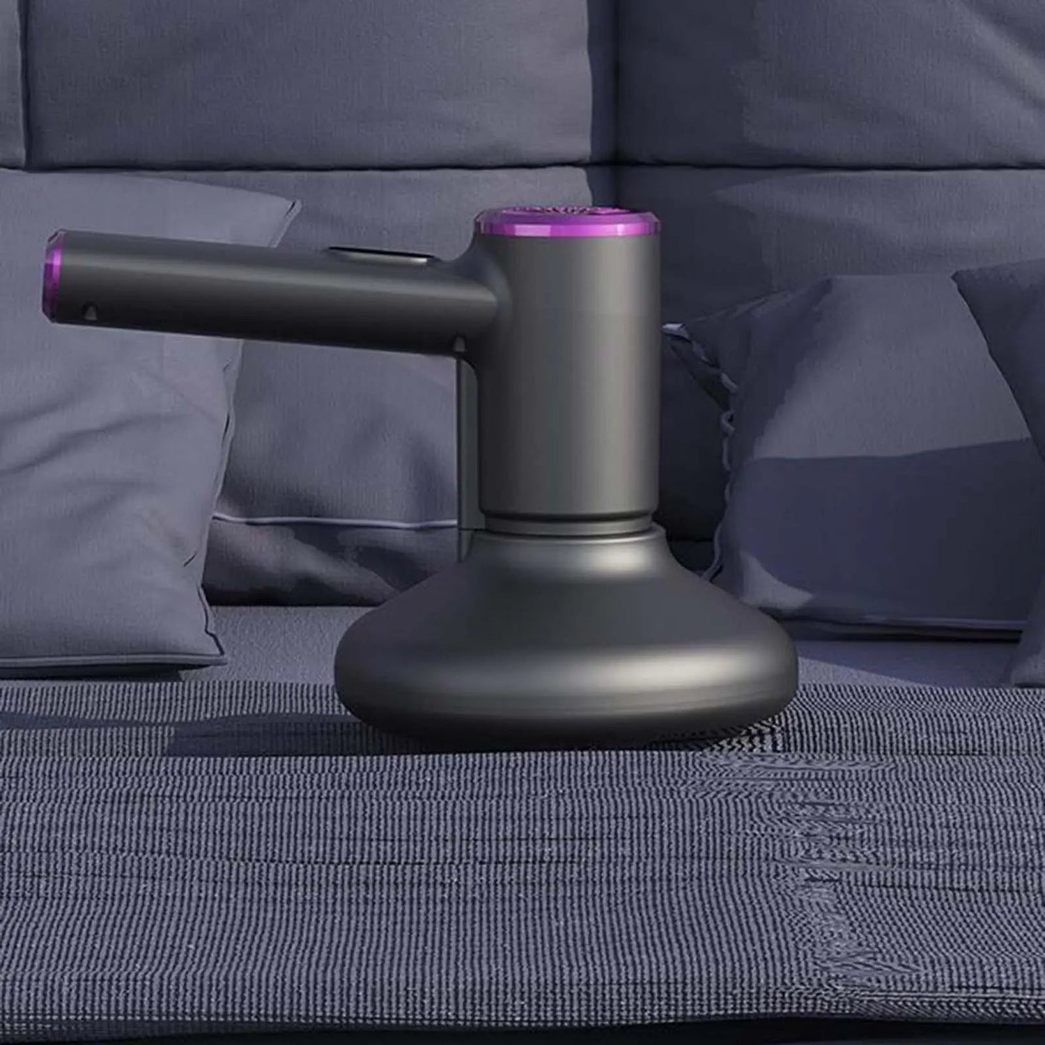 Maroon Asteria handheld vacuum cleaner for bedrooms and living rooms, designed for effective cleaning of beds and surfaces.