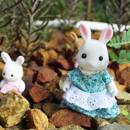 Cute rabbit doll from AliExpress, part of a 1/12 micro dollhouse collection with reindeer, sheep, elephant, and squirrel figures.