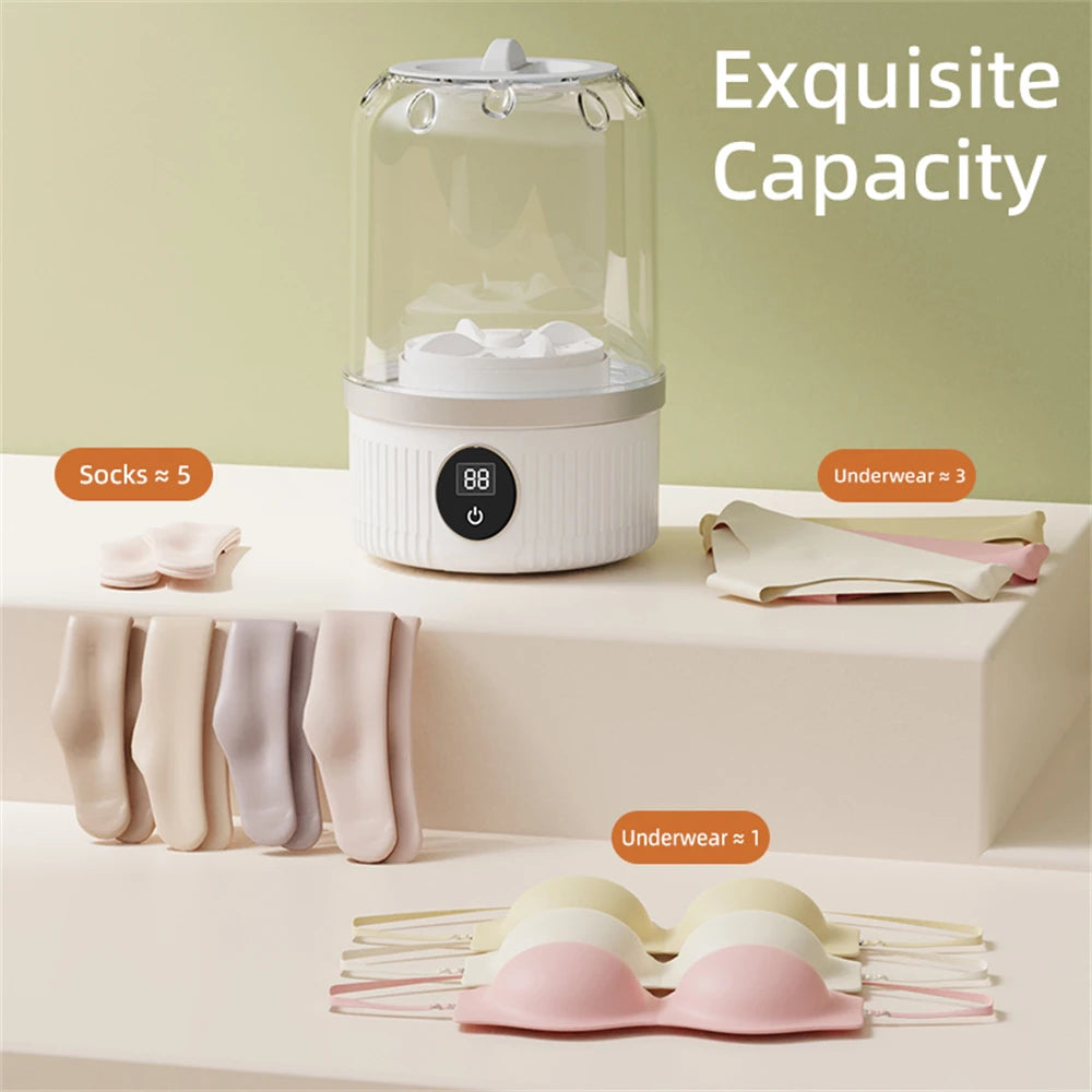 Portable Maroon Asteria mini washing machine for underwear and socks, compact home improvement appliance with digital controls.