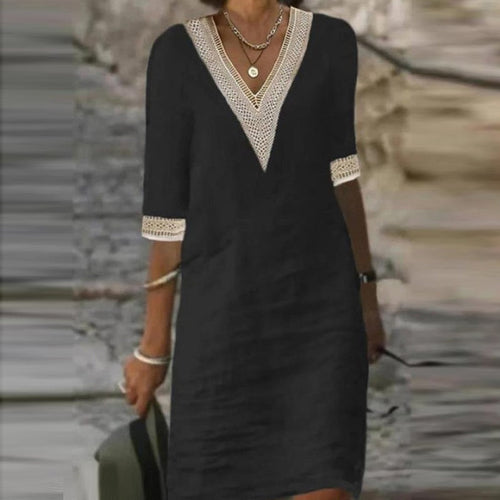 Elegant cotton linen dress from Yellow Eleusis, showcasing a flowing design with subtle textures and soft fabric details.