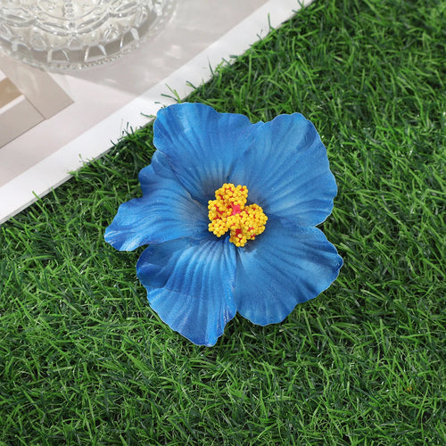 Raspberry Eurybia Away Hawaiian Flower Hair Clip with vibrant floral design for hair decoration and styling.