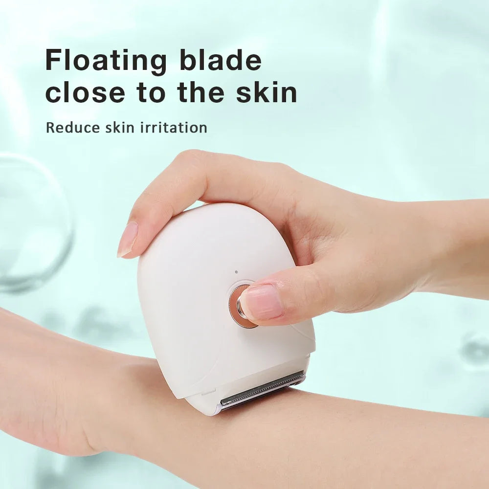 Maroon Asteria waterproof women’s hair removal machine trimmer with knife tip, suitable for whole body hair removal.