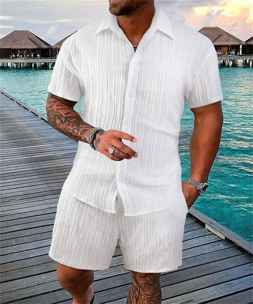 Irie Men beach shorts set by Raspberry Eurybia, featuring colorful swimwear with tropical patterns, suitable for beach and pool.