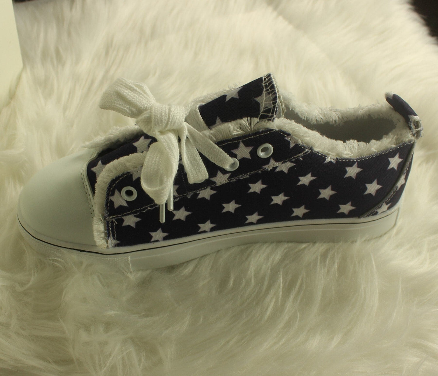 Silver Juneberry star-striped lace-up flats with round toes, casual sneakers featuring a stylish star pattern and comfortable design.