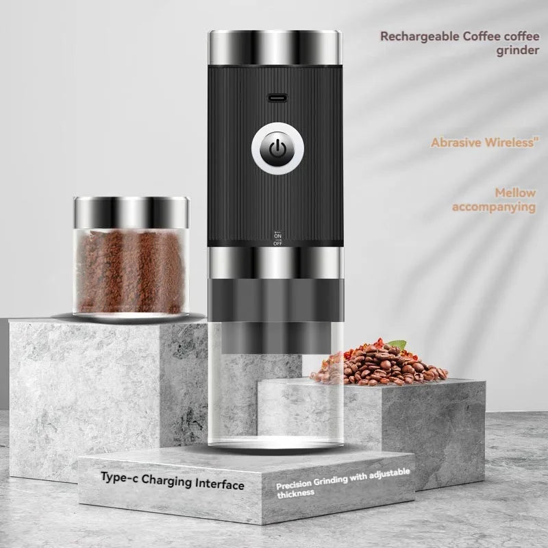 Maroon Asteria portable electric coffee grinder with USB charging, compact wireless kitchen appliance on a countertop.