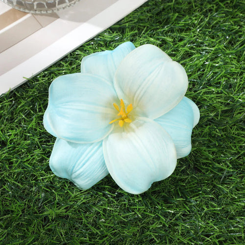 Raspberry Eurybia Hawaiian Flower Hair Clip with colorful floral design for hair decoration and styling.