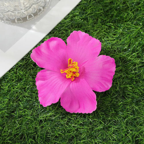Raspberry Eurybia Away Hawaiian Flower Hair Clip with vibrant tropical flower design on a metal hair accessory.