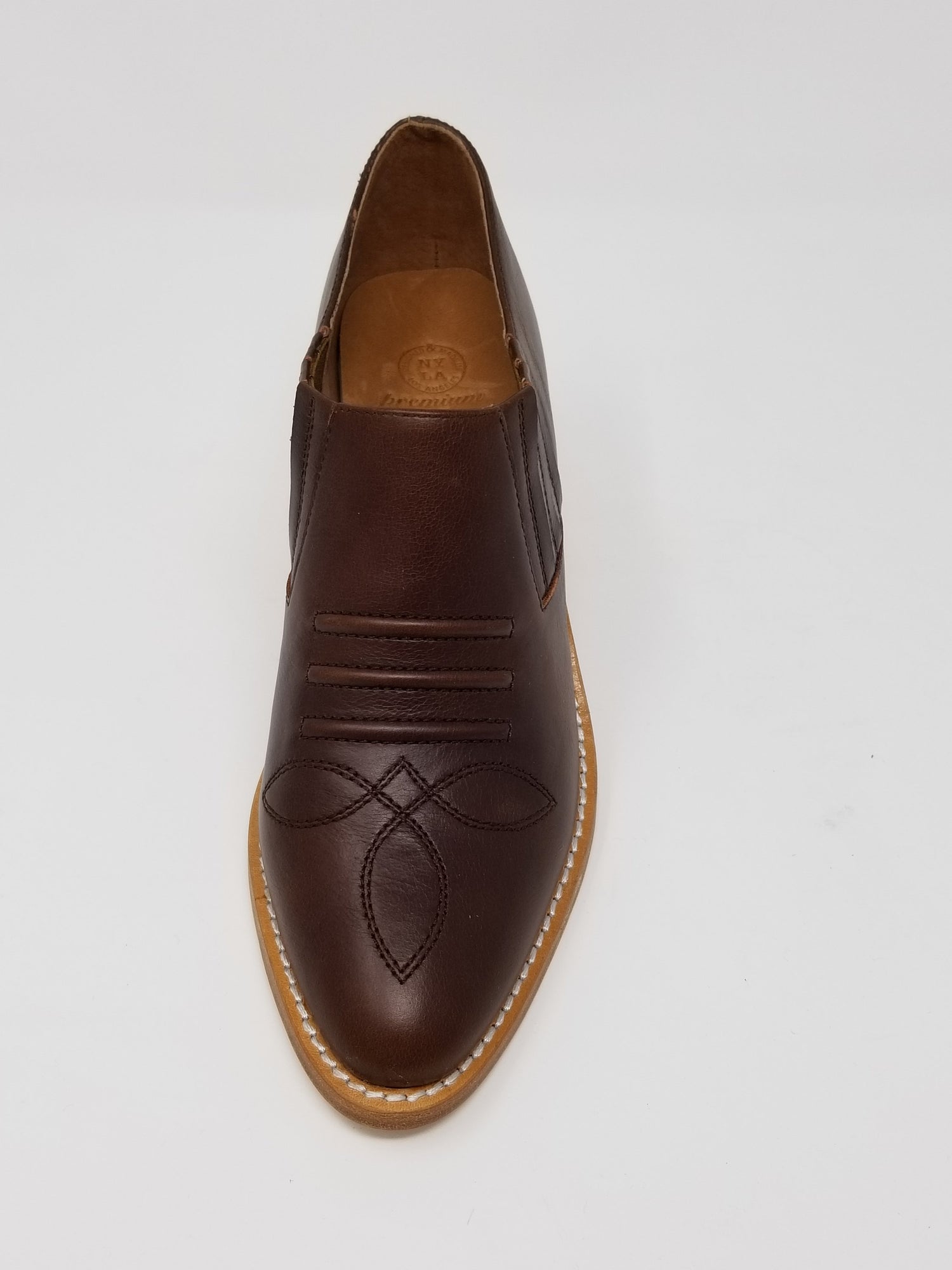 Front view of Azure Ophion Santa Ana whiskey-colored footwear, showcasing its stylish design and craftsmanship.