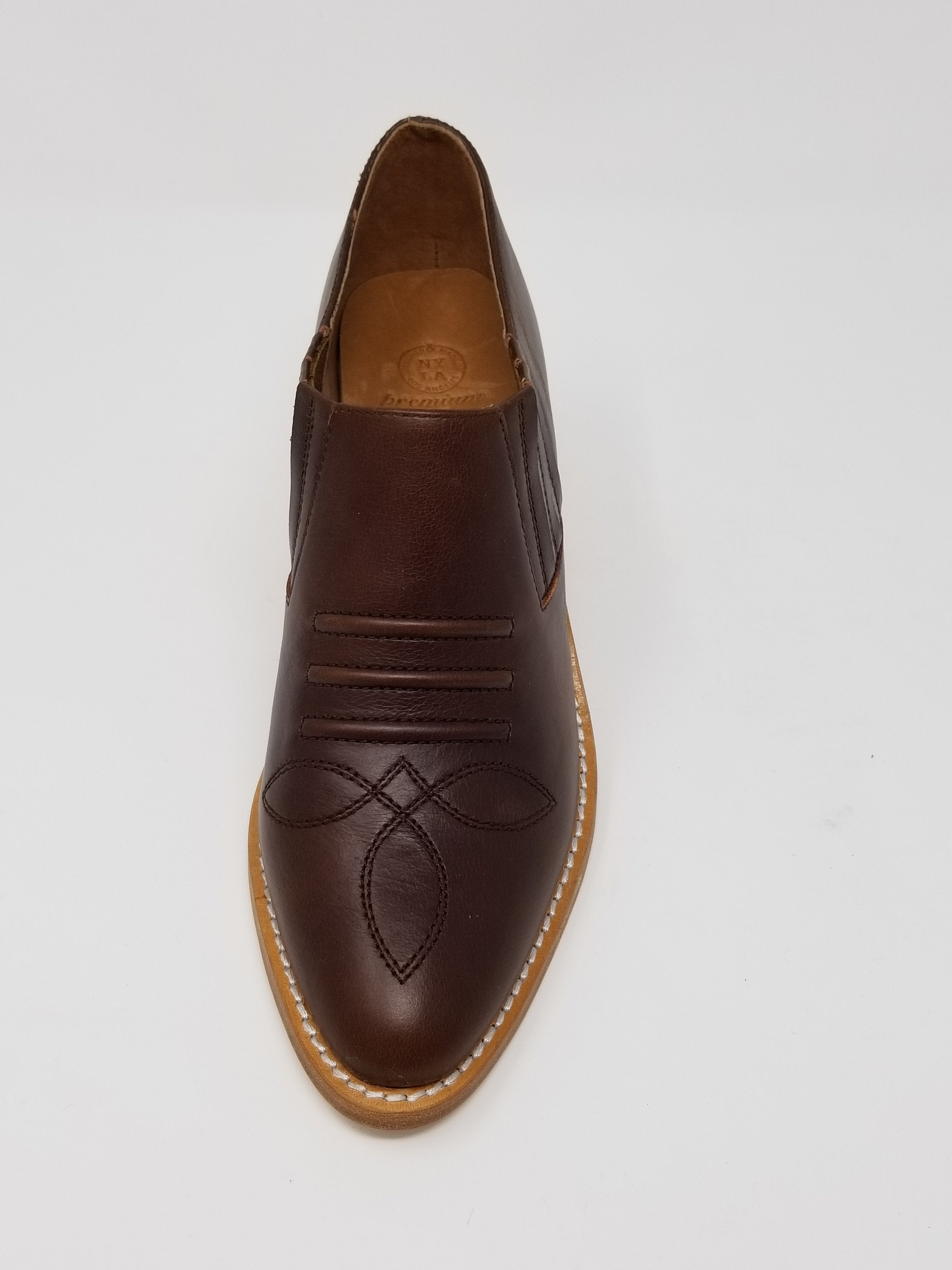 Front view of Azure Ophion Santa Ana whiskey-colored footwear, showcasing its stylish design and craftsmanship.
