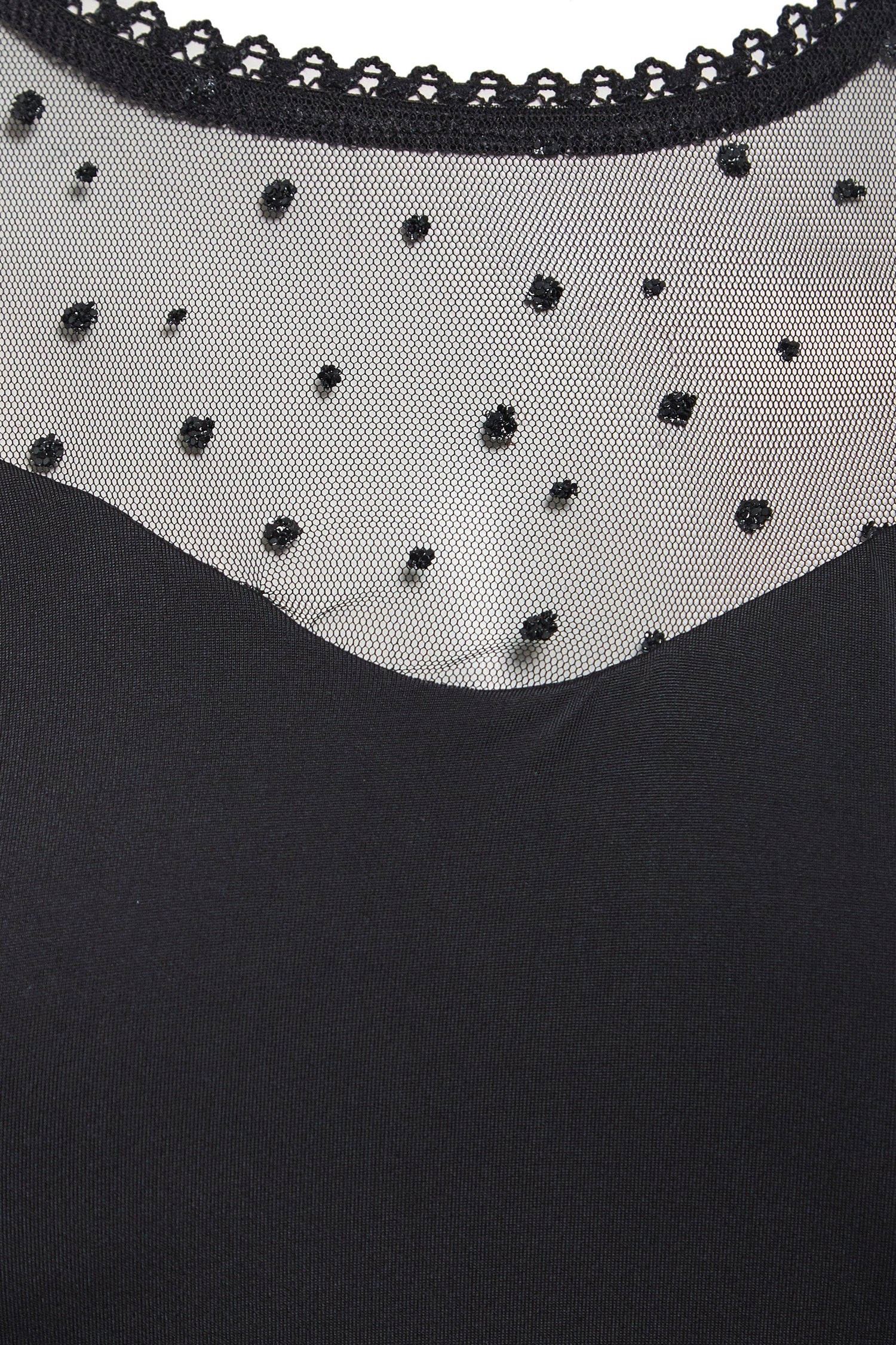 Long-sleeve mesh bodysuit by Blush Athena, featuring sheer fabric and fitted style, displayed on a neutral background.