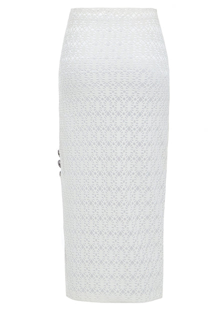 White bodycon lace skirt from Blush Athena, styled as a dress, featuring intricate lace details and a fitted silhouette.