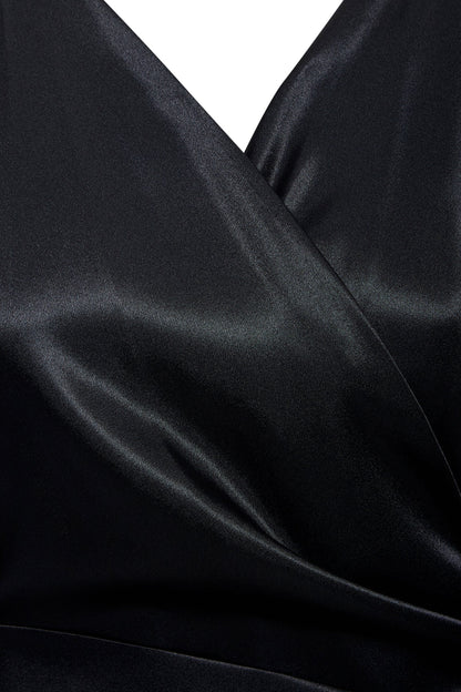 Black wrap maxi dress by Blush Athena, featuring a flowing silhouette and elegant design, perfect for formal occasions.