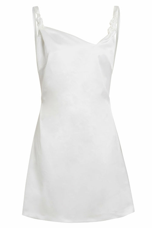 Blush Athena A-Line mini slip dress in soft fabric, featuring a flattering silhouette and subtle detailing on a neutral background.