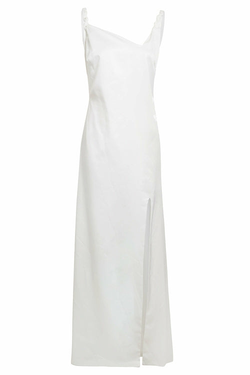 White asymmetric maxi dress by Blush Athena, flowing fabric with elegant drape and stylish asymmetrical design.