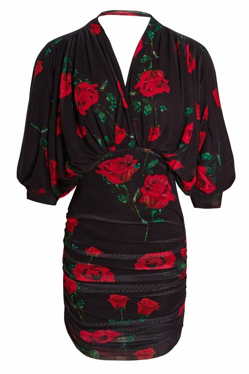 Black ruched batwing mini dress by Blush Athena, featuring a fitted bodice and flowing sleeves, stylish for evening wear.