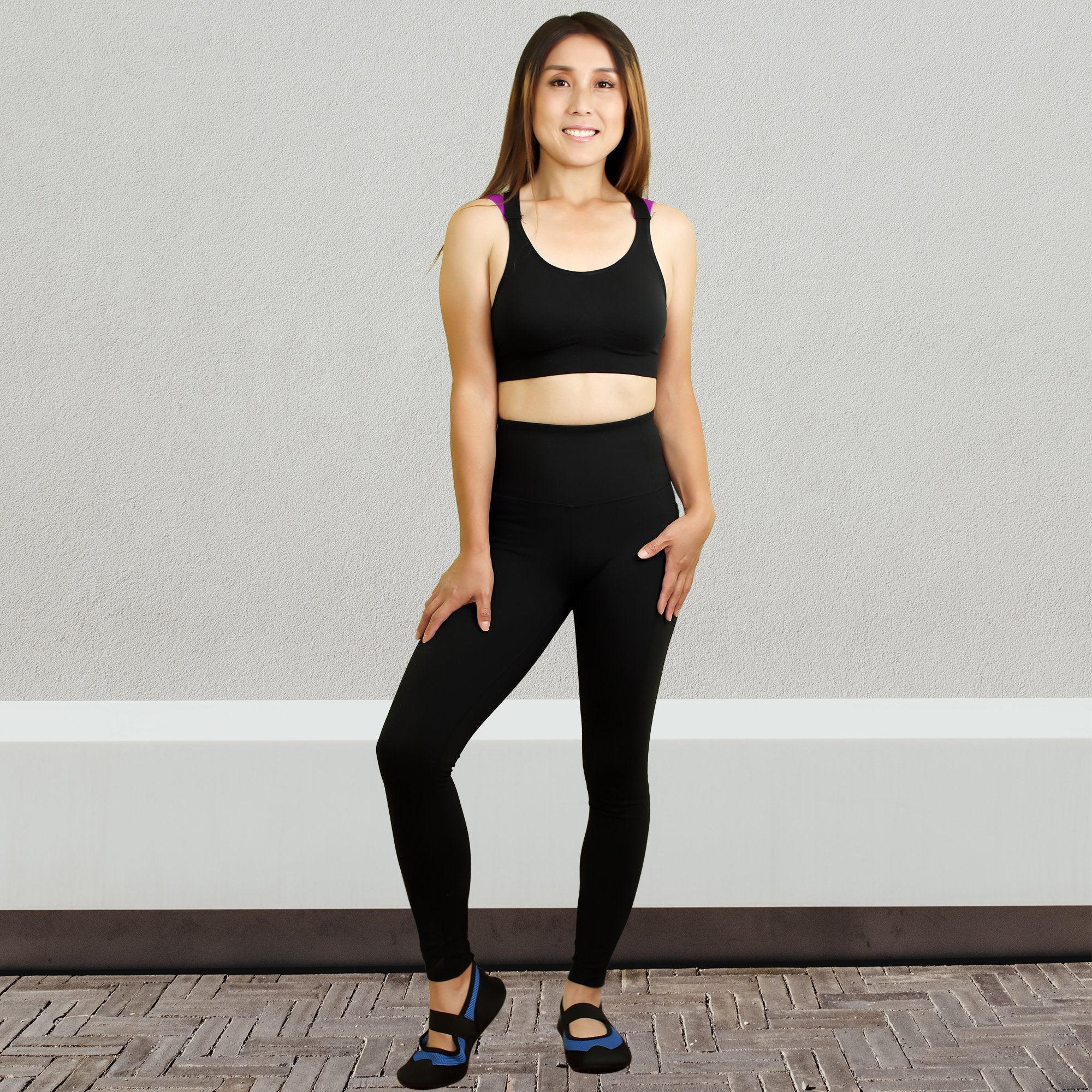 Crimson Gaia SOBEYO black padded sports bra with elastic straps and cross back design, ideal for activewear and workout sessions.