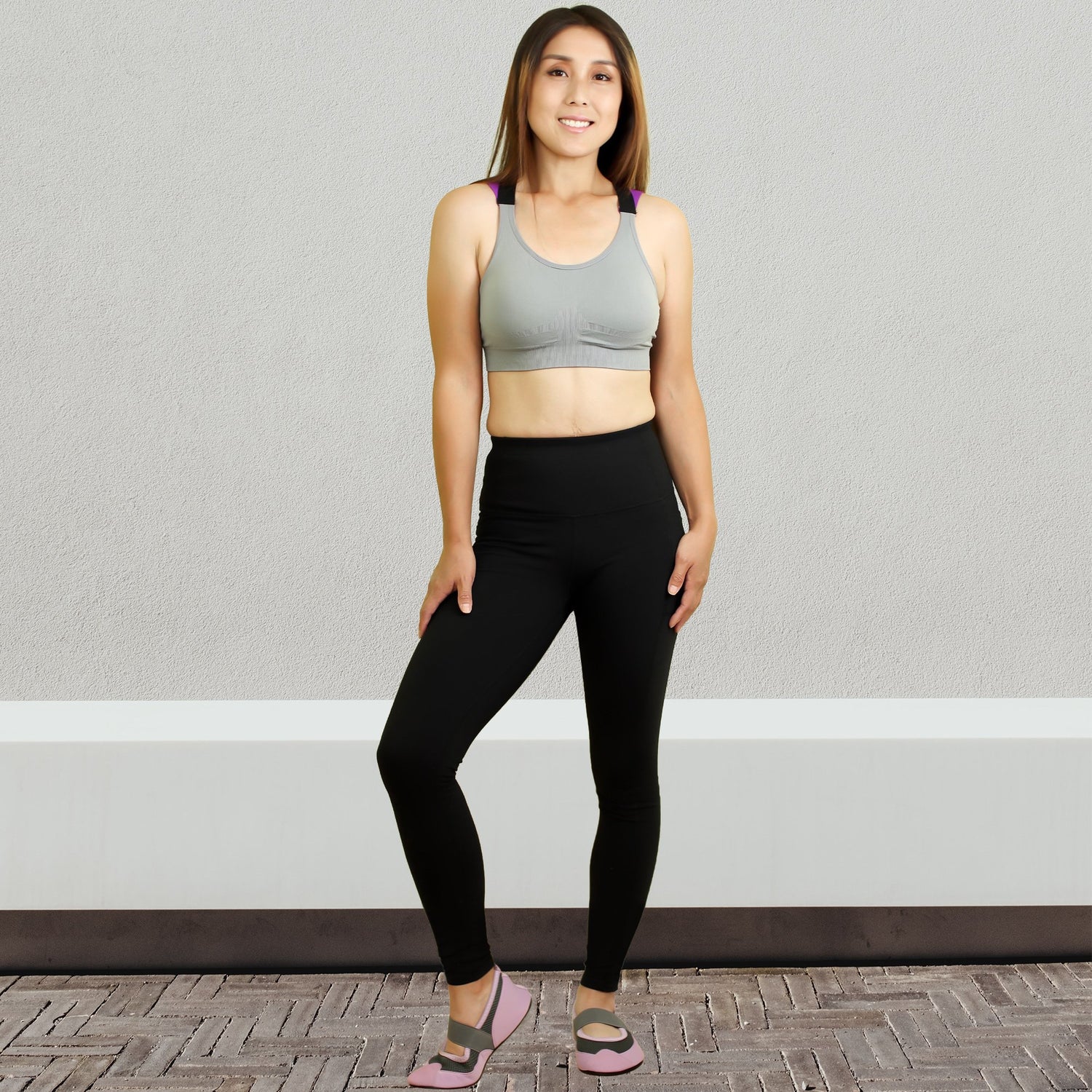 Crimson Gaia SOBEYO gray padded sports bra with elastic straps and cross back design, ideal for activewear and exercise.