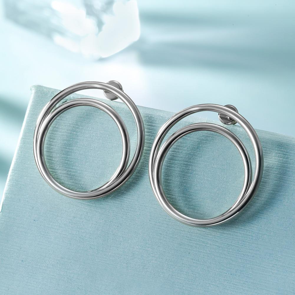 Lavender Phoebe double layered hoop earrings in silver-tone metal, showcasing a stylish and elegant jewelry accessory.