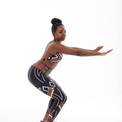 White Oliver Ibeekay Splash leggings, vibrant activewear with colorful splash patterns, shown on a model for workout and casual wear.