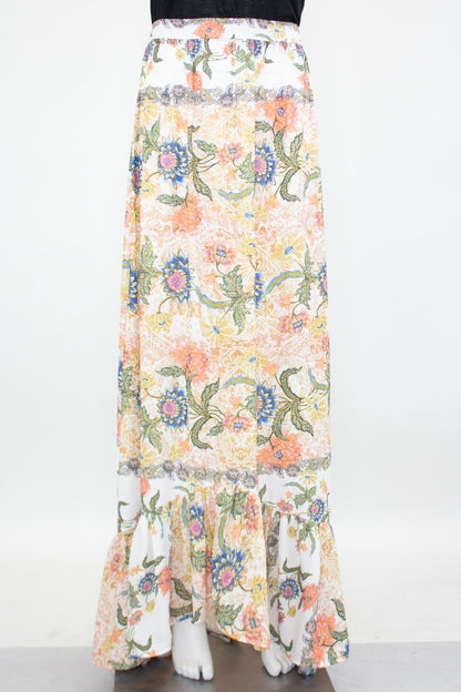 Yellow Hera floral maxi skirt with flared bottom, featuring vibrant flower patterns and flowing fabric.