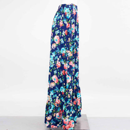 Yellow Hera flared bottom flower maxi skirt with vibrant floral pattern, flowing fabric, and high waist design.