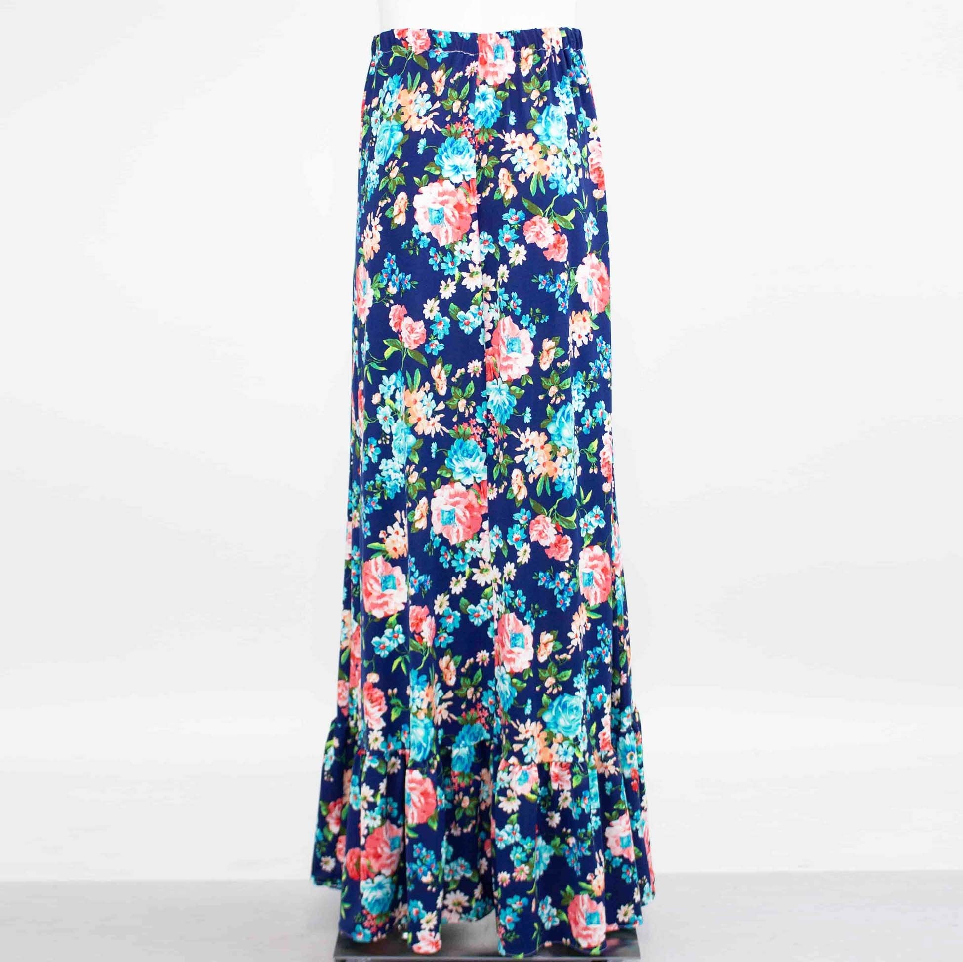 Yellow Hera flared bottom flower maxi skirt with vibrant floral pattern, flowing fabric, and high-waisted design.