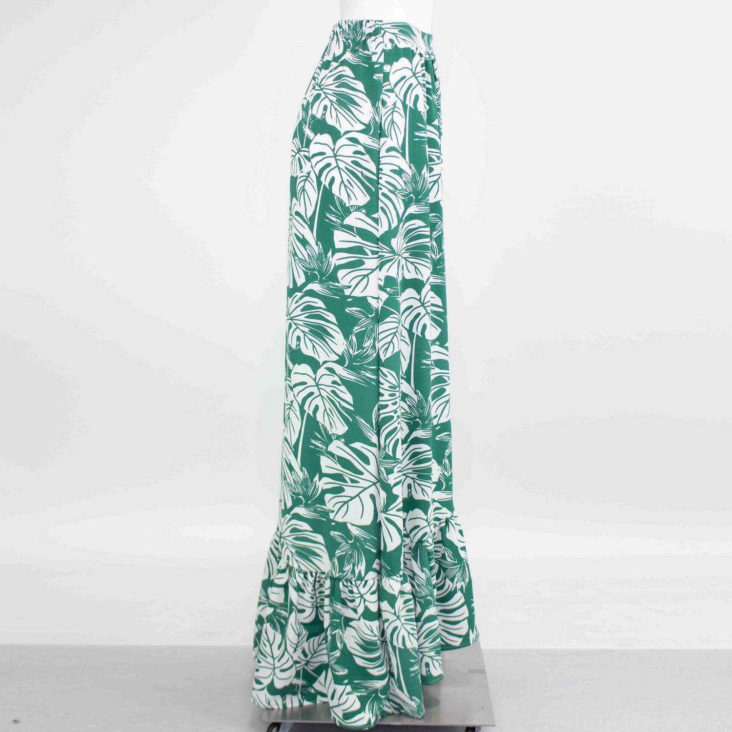 Yellow Hera flared bottom leaf maxi skirt with flowing fabric and vibrant leaf pattern, perfect for boho or casual styles.