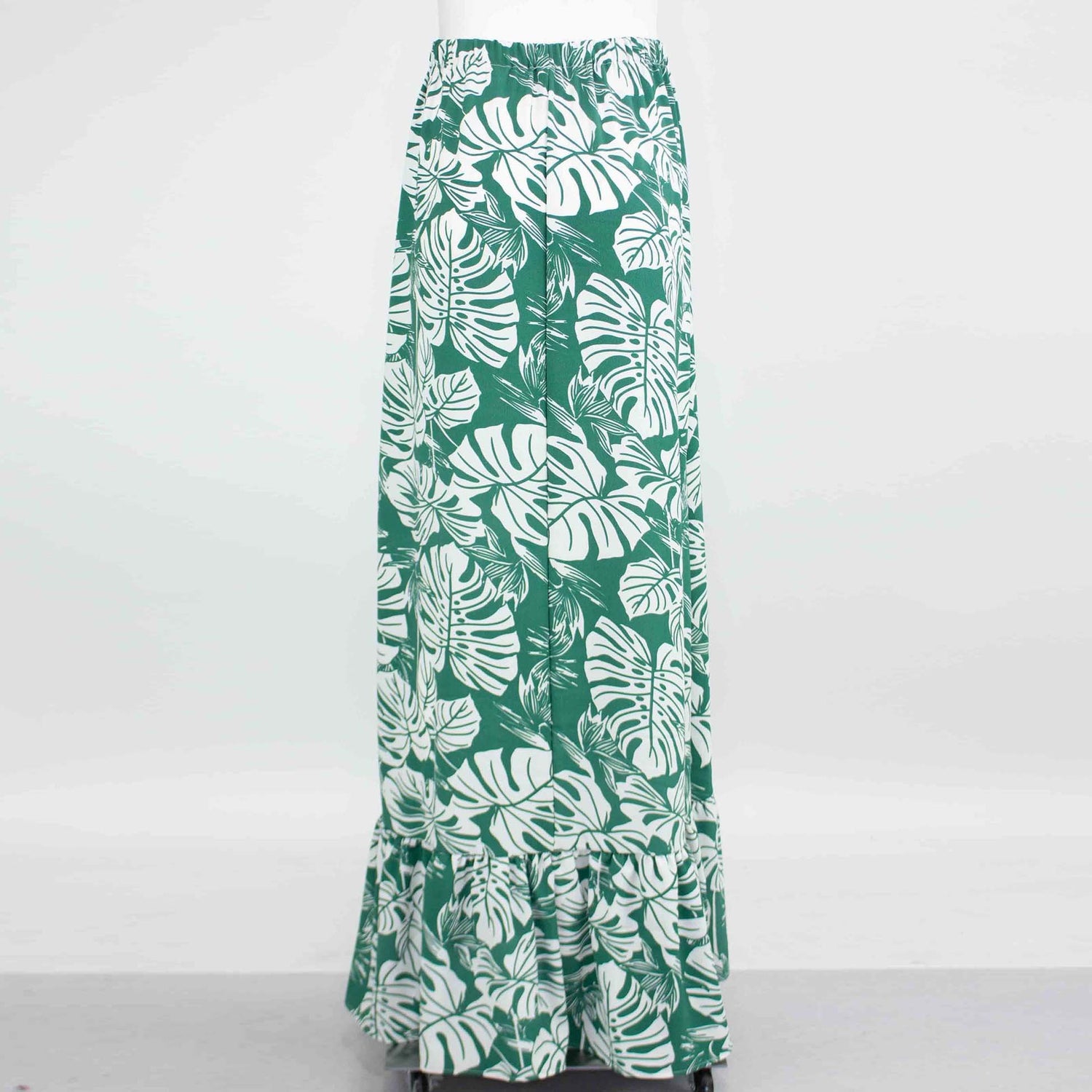 Yellow Hera flared bottom leaf maxi skirt with flowing fabric and vibrant leaf pattern, perfect for bohemian or casual wear.