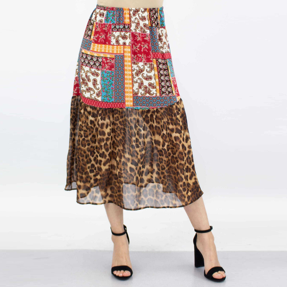 Yellow Hera animal print color block skirt in red, featuring bold animal patterns and vibrant color blocking, perfect for stylish outfits.