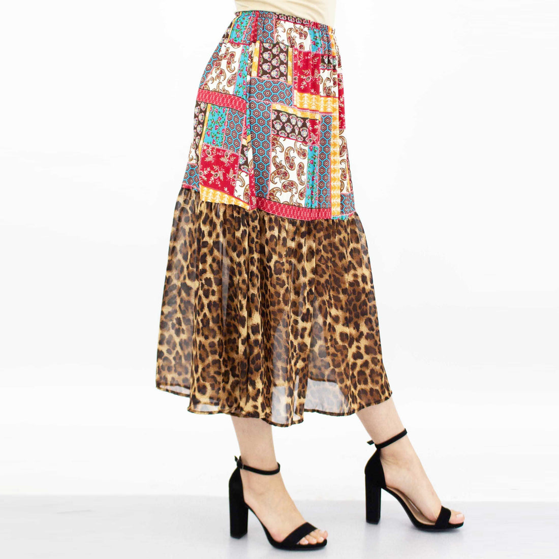 Yellow Hera animal print color block skirt in red, featuring bold animal patterns and vibrant color blocking, stylish and trendy.