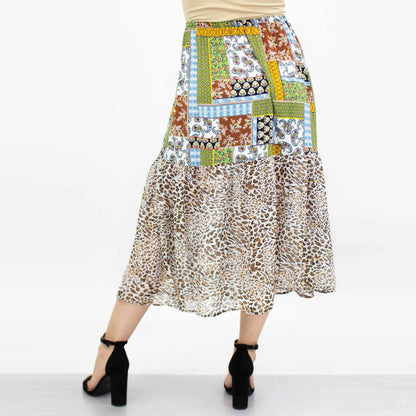 Green animal print color block skirt from Yellow Hera, featuring bold patterns and vibrant fabric for stylish casual wear.