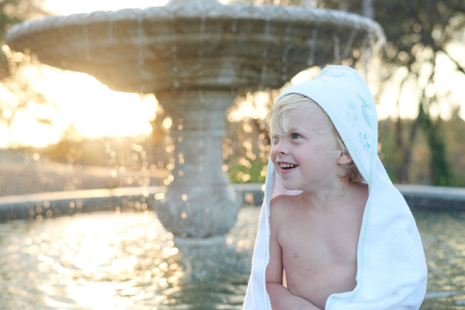 Kids and babies whale hooded towel set by Lavender Charlie, featuring a soft cotton towel and washcloth with whale design.