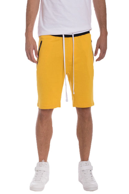 Yellow Lime Milo French Terry Shorts with an elastic waistband and relaxed fit, suitable for casual wear.